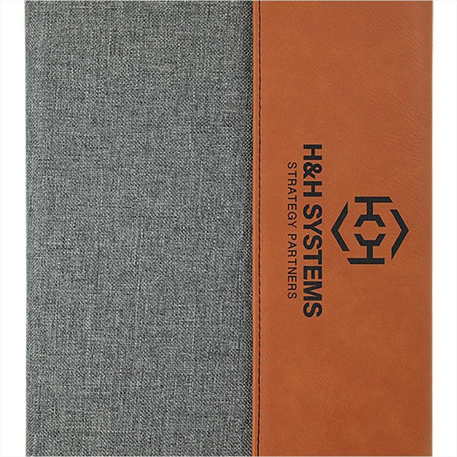 gray fabric 7"x9" portfolio closed with rawhide leatherette flap engraved with black engraving