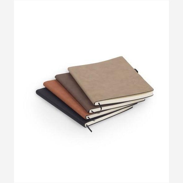 Stack of black, light brown, dark brown, tan leatherette journals