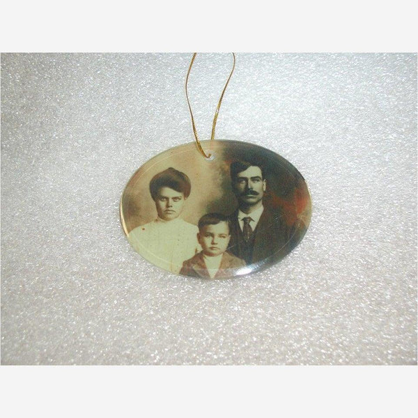 3.5 inch oval glass ornament with old time photo printed gold stretch string