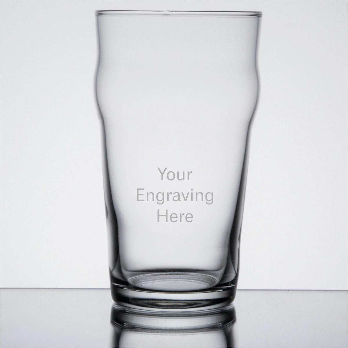 English pub drinking glass with "your engraving here" text