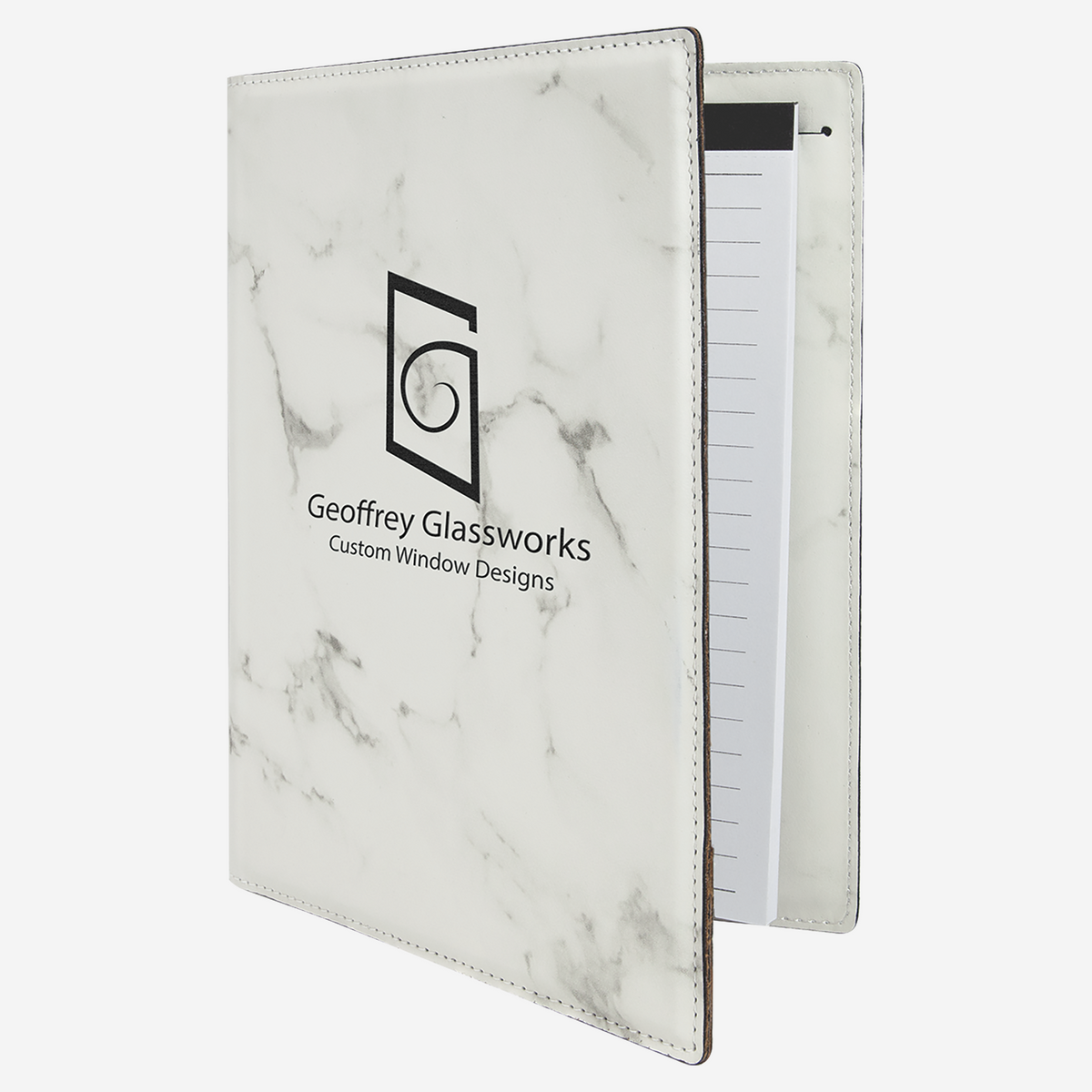 7" x 9" Laserable White Marble Leatherette Small Portfolio with Notepad partial open view with black Geoffrey Glassworks logo with partial notepad view