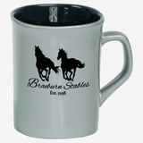 silver/gray ceramic coffee mug with black engraving